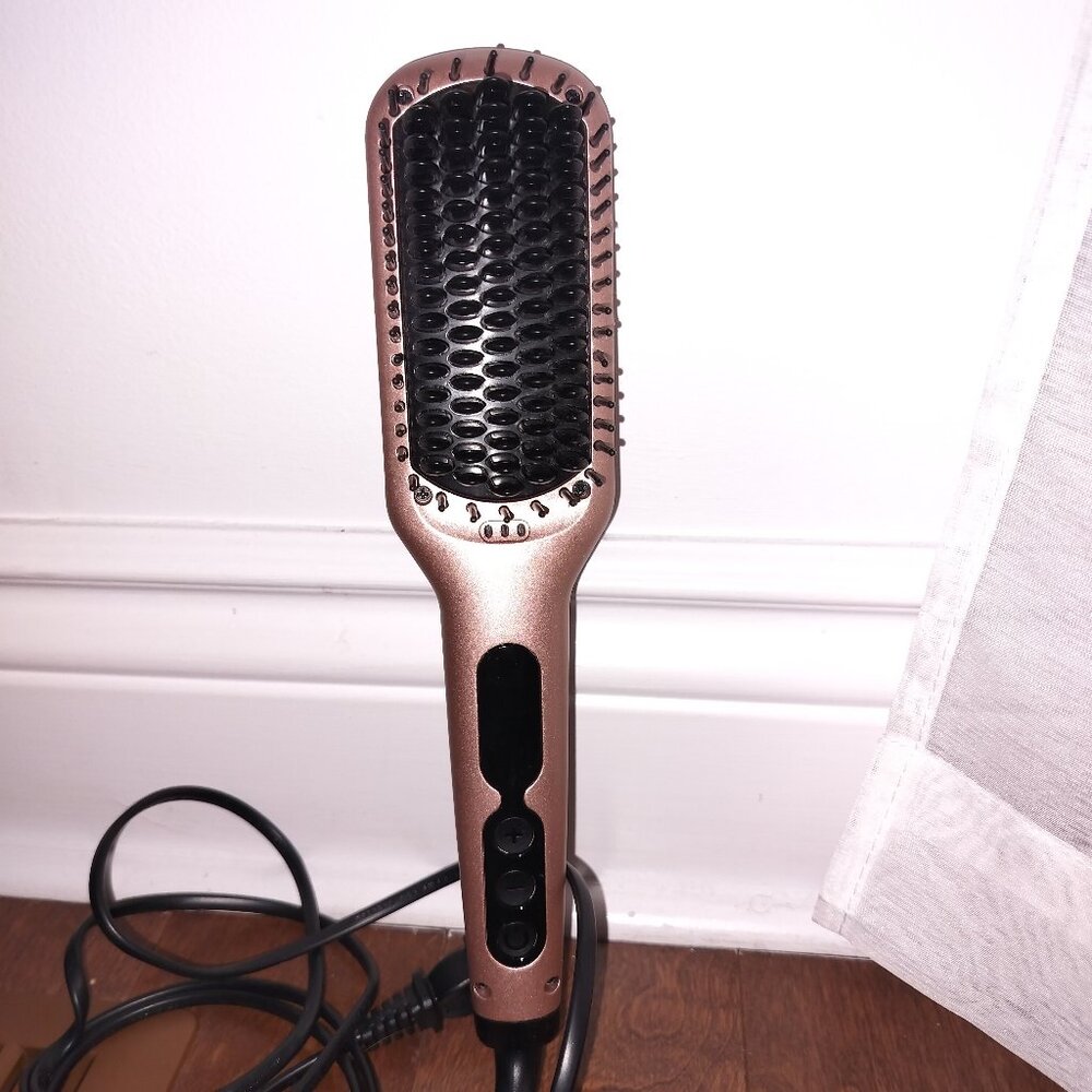 Hair straightening comb (hot comb)